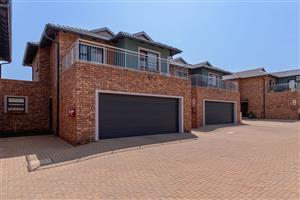 Modern Elegance Meets Practical Living in This Stunning Duplex Cluster