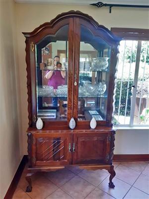 Antique imbuia showcase with beveled glass. 