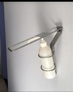 Elbow wall mount dispenser
