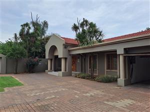 Spacious and very neat 4 Bedroom house double garage and pool in enclosed area for rent