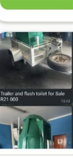 Trailer with  construction  flushable toilet