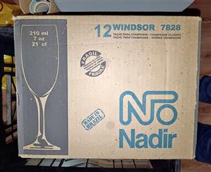 A box of 12 Nadir Windsor champagne flutes (item code 7828)