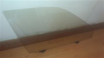 Toyota Corolla bubble original Toyota driver door glass for sale good condition