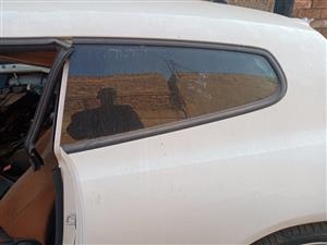 Vw scirocco 2010 1.4 tsi left rear body glass