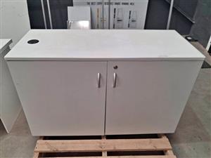 White 2 door cupboard. Size 120 x 50 x 75. Collection in Rivergate