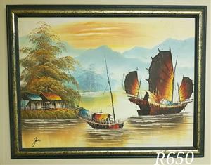 Boats on river scene framed painting