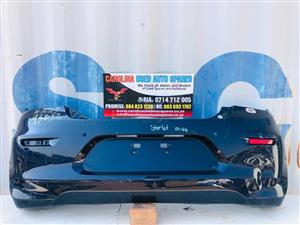 Toyota Starlet rear/back bumper with right reflector light and pdc holes