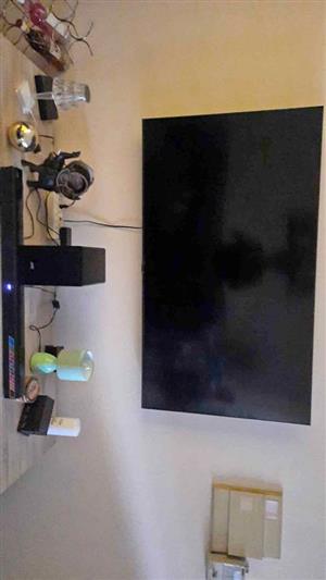 65inch Samsung Smart TV + JVC sound and subwoofer for sale.
