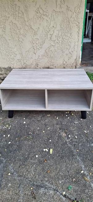 Modern coffee table with open storage