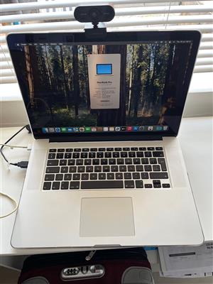 Apple Macbook Pro 15", 2.5GHz i7 processor.