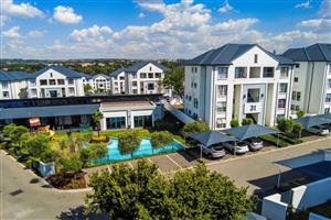 Lovely modern UNFURNISHED 1 bed 1 bath top floor apartment at The Cambridge in Petervale, Bryanston