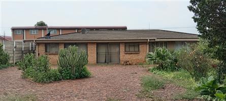 Spacious 4-Bedroom Home with Bachelor’s Flat & Entertainment Haven!