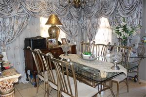 A Testament of Elegance and Glamour with two Outbuildings.