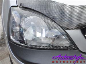 Opel Corsa 02+ Carbon Look Headlight Guard
