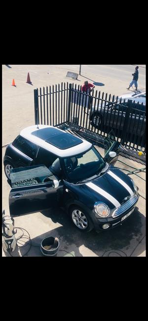 2007 Mini Cooper 1.6 Petrol, Navy Blue with White Racing Stripes.
