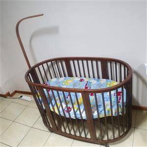 Wooden Oval baby crib