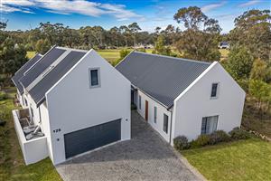 Immaculate Home with Scenic Views and Movie Room Feature