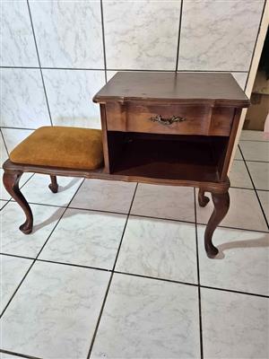 A Queen Anne gossip bench, commonly known as a telephone table