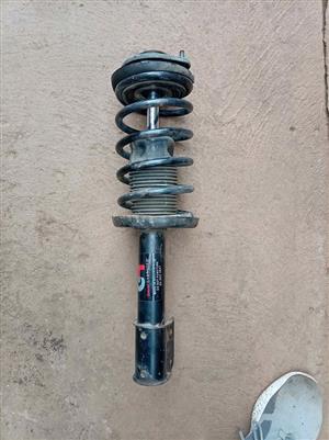 Opel Corsa coil spring shock