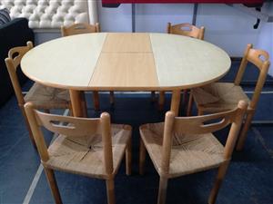 Second hand 7 pieces beechwood dining room suite