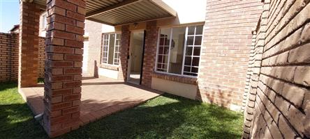 Neat free-standing duplex in secure estate