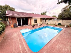 Spacious Family Living with Indoor Braai, Pool & Solar Power in a Prime Location