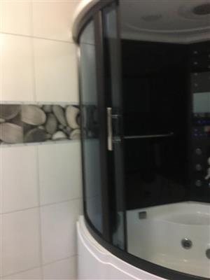 Electrical shower with TV and radio