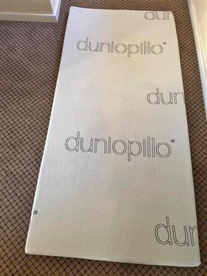 Dunlopilo single Mattress. Just bought and Used for 1 week only . Like new  NO MARKS. 
