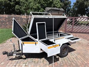 Camping trailer with rooftop tent 