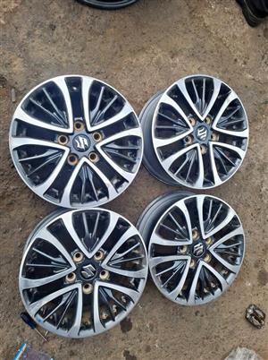 Suzuki Ertiga original alloy mags size 15 aset