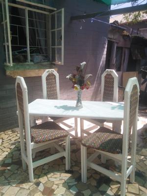 New table and 4 chairs