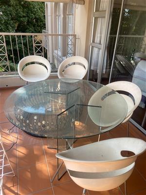 Glass table with chairs