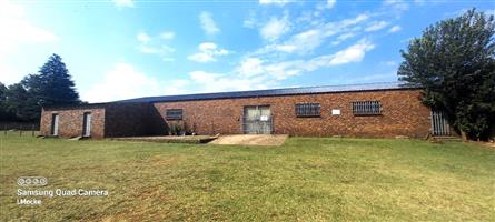 Prime Waterfront Property: Industrial and Residential Zoning, 50 Meters of River Frontage for Sale