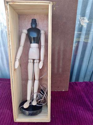 Mannequin lamp in storage box