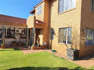 Stunning low maintenance face brick double story home. Perfect design, neat as a pin.