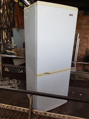 White 320 liter double door fridge freezer with all its racks in good condition and working 100% for sale - R1695 cash if you collect . Height 160cm , width 60cm , depth 60cm.  I CAN DELIVER for R200.  Whatsapp , sms or call Pierre on 0825784861.