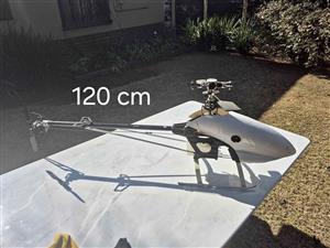 Large radio-controlled helicopter, likely a Vario Benzin model