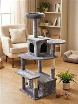 Large cat tree  With hidey holes and scratch posts  Brand new