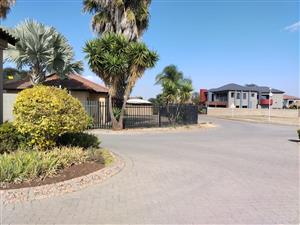 Discover 500m² of prime vacant land in Safari Park, Brits—your canvas for a dream property awaits!