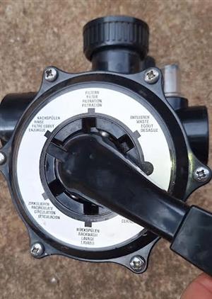 Multiport valve, pump filter basket and vacuum weir lid for swimming pool pump