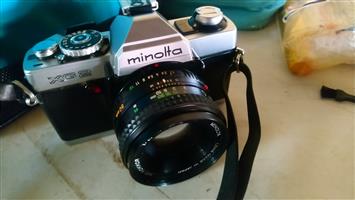 MINOLTA XG 2 camera with a MD Rokkor 59mm lens