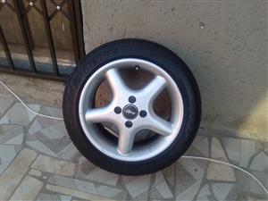 15 inch rims and tires(4 holes)