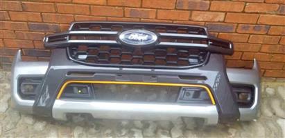 FORD RANGER GRILL WITH BADGE AND BUMPER. BRAND NEW. FOR VARIOUS OTHER CARS TOO.
