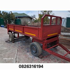 Four wheel light duty farm trailer