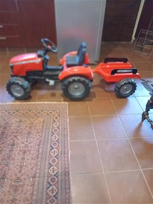 Genuine new Massey Ferguson pedal ride on tractor and trailer.
