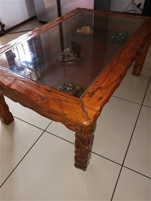 Big 5 coffee table with glass top 