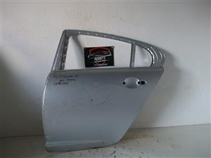 Jaguar XF 09-14 left rear door 