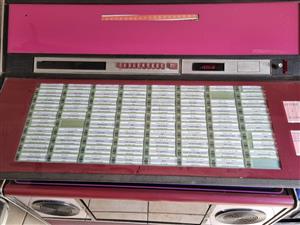Rock Ola 454 7 singles player Jukebox with various singles included