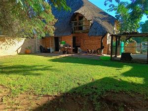 Lovely Face Brick Double Storey Townhouse with Thatched Roof.