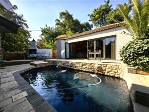 Spacious 4-Bedroom Family Home with Two Income-Generating Flats, Stunning Pool & Entertainment Areas